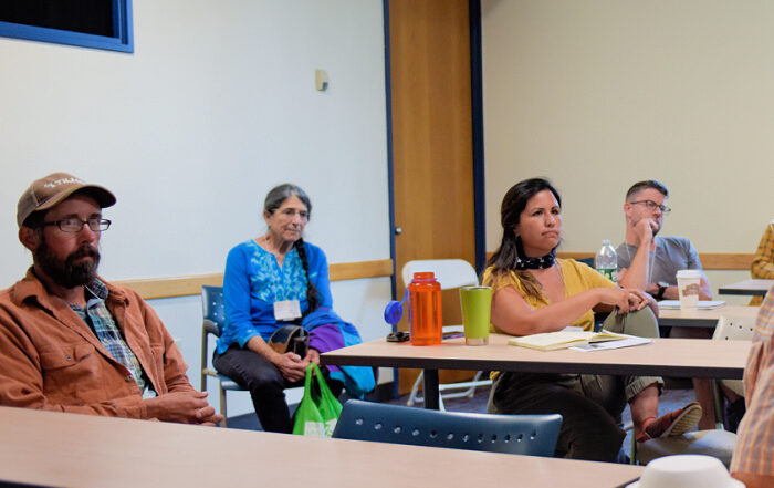 People listening at a NOFA workshop